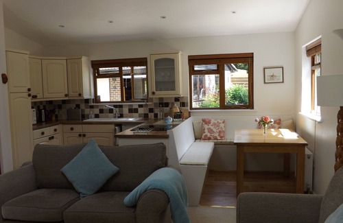 Bognor Regis Ski Chalet | A beautiful pine chalet with its own private garden surrounded by fields