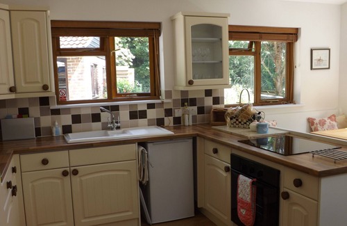 Bognor Regis Ski Chalet | A beautiful pine chalet with its own private garden surrounded by fields