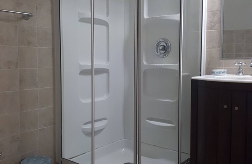 Coral Harbour Apartment | A beautiful apartment on a oceanfront property directly on coral harbour beach.