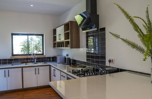Baruti West Cabin | A beautifully modern home with a twist of wooden cabin feel!