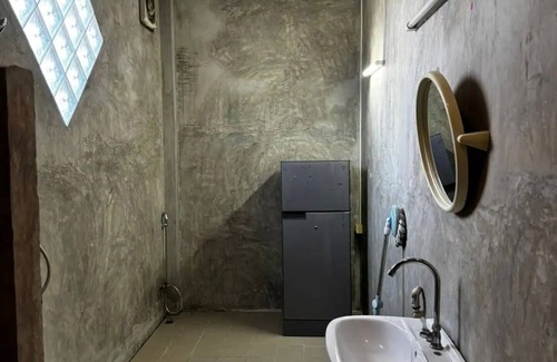 Luang Prabang Apartment | A bedroom in a local area!