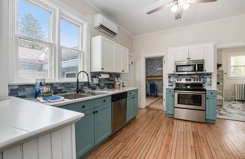 Ludington House | A block from the beach! Sleeps 20! Hot Tub, Game Room!