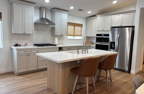 Newport Shores Condo | A Block From The Waves and Newly Remodeled.