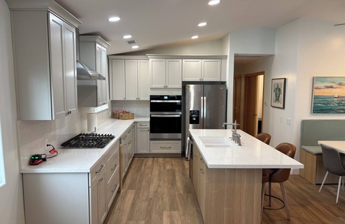 Newport Shores Condo | A Block From The Waves and Newly Remodeled.