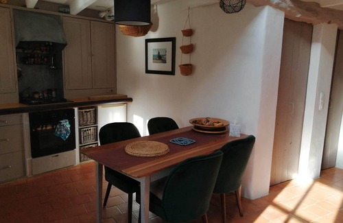 Bouin Cottage | a charming little house deep in a fenced garden with stone walls