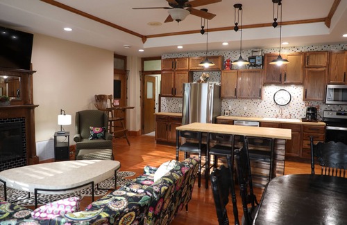 Oskaloosa Apartment | A Class-y & spacious 1500 square foot retreat in a century old brick schoolhouse