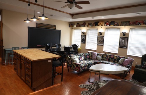 Oskaloosa Apartment | A Class-y & spacious 1500 square foot retreat in a century old brick schoolhouse