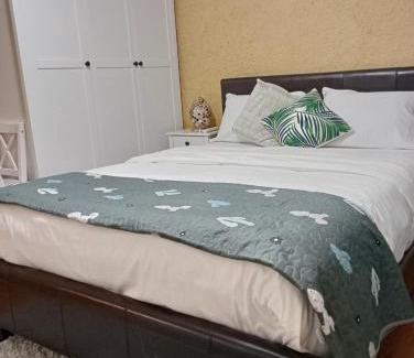 Cork House | A Comfy Bedroom and Bathroom on own private top floor of a Home Stay 10 minutes Walk to the Ctr Free Parking