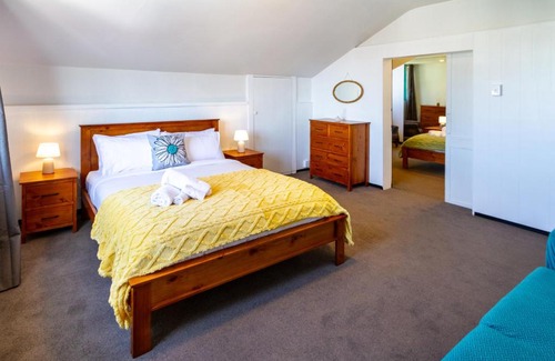 Hornby Apartment | A comfy family stay near Hornby Mall Sleeps 8