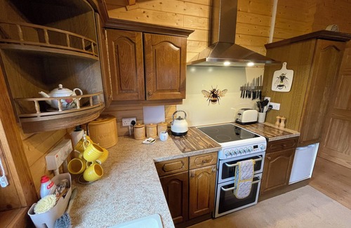 Grimley Cabin | A Cosy, pet-friendly, Rural Cabin with far reaching views over the countryside
