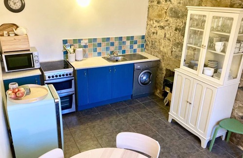 Crosswell Cottage | A cosy stone farm cottage