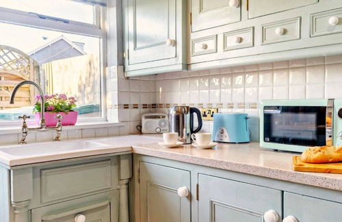 Bryncethin Cottage | A cozy 200 year old beamed cottage. pet friendly,secure garden.