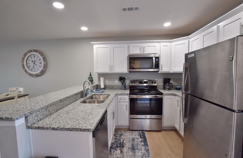 Osage Beach Condo | A COZY GETAWAY!Spectacular Main Channel Wtrfrt Condo Walkin Level 2BR-Unit 10210