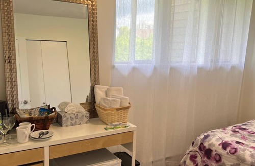 Central Lonsdale Bed & Breakfast | A cozy room, queen bed, 1/2 guest(s), free parking in the heart of Lonsdale Ave.