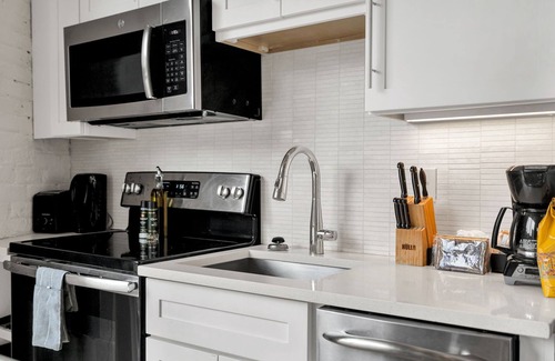 Faubourg Marigny Hotel | A dreamy 2-bedroom hideaway in the vibrant Marigny, this charming retreat blends classic New Orleans style with modern comforts. Located just steps from the music, art, and dining of Frenchmen Street and a short stroll to the French Quarter.