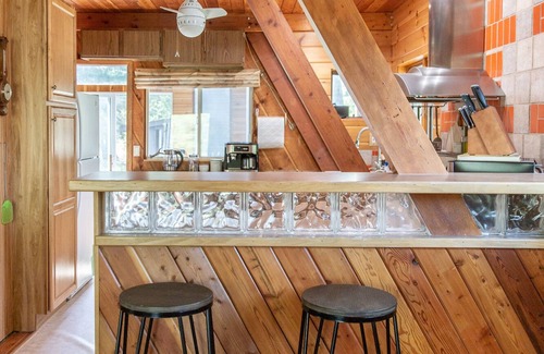 Thompsonville Cabin | A-Frame Cabin on Betsie River – Private Dock & Fishing Near Crystal Mountain