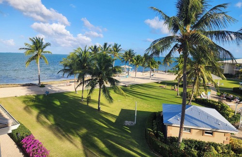 Crystal Harbour Apartment | A Getaway in Paradise! Unit with Full Kitchen, Outdoor Pool, Free Parking!