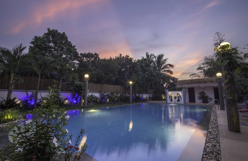 Siem Reap House | A home away from home! Coliving building with private rooms and shared areas.