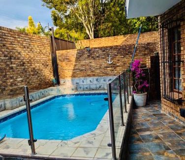 Faerie Glen House | A Home in Faerie Glen near Sun Bet Arena