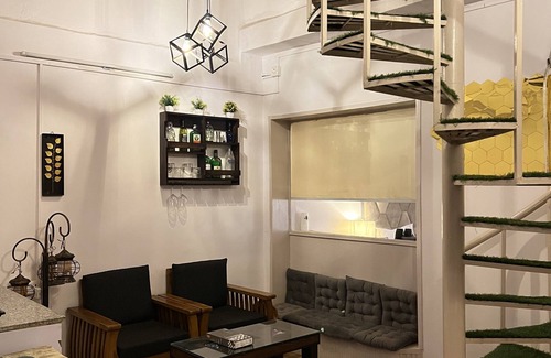 Hauz Khas Apartment | A king size bed and urban retreat in the heart of Hauz Khas Village.