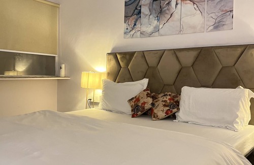 Hauz Khas Apartment | A king size bed and urban retreat in the heart of Hauz Khas Village.