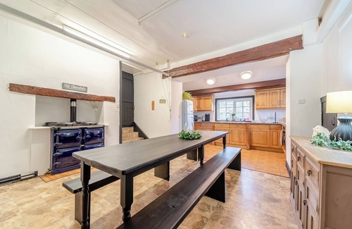Newton Stewart Cottage | A large, detached farmhouse with open views of the countryside.