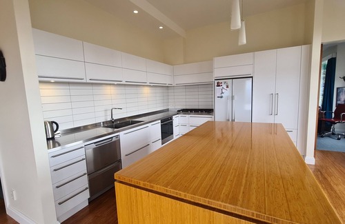 Brooklyn House | A large modern home in central Wellington. Harbour and bush views.