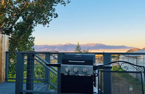 Bozeman Apartment | A large sundeck, 2 bedrooms, 1 sofa bed, a stocked kitchen and a full bathroom.