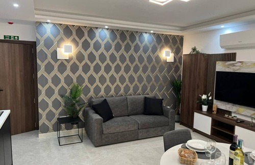 Bugibba Apartment | A modern apartment block in the heart of Bugibba. All one-bedroom flats, stylishly finished and fully equipped with comfort, ideally located close to shops, services, and all amenities.