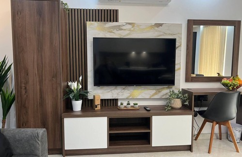Bugibba Apartment | A modern apartment block in the heart of Bugibba. All one-bedroom flats, stylishly finished and fully equipped with comfort, ideally located close to shops, services, and all amenities.