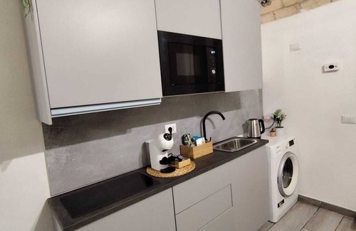 Prenestino-Centocelle Apartment | A Modern Refuge in Rome: Relaxation amidst Garden and Whirlpool