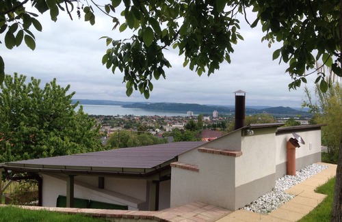 Balatonfured House | A newly renovated old wine cellar with a view of Lake Balaton and the city.