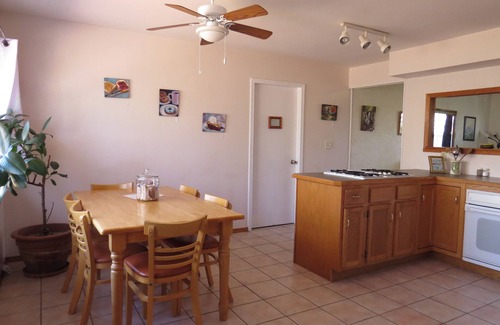 Miramiguoa Park House | A nice view of the woods awaits you from the countryside kitchen window and deck