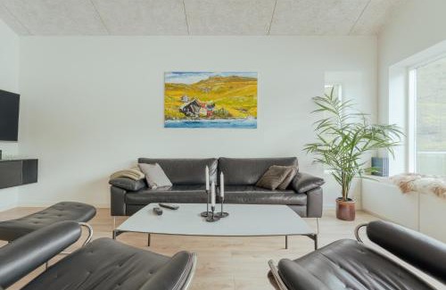 Faroe Islands Villa | A pearl in a forgotten fjord - Luxury Boathouse