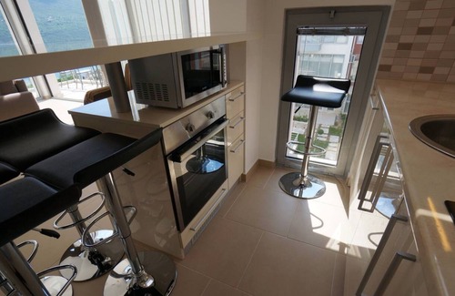 Denovici Apartment | A Penthouse above the sea with a big infinity pool and a children pool
