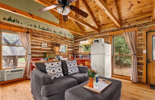 Canyon Lake Cabin | A perfect retreat from today's hectic pace and stressful lifestyle. Located just three miles from scenic Canyon Lake, The Cedar Cabin Retreat is a beautiful one bedroom Hill Country log cabin.