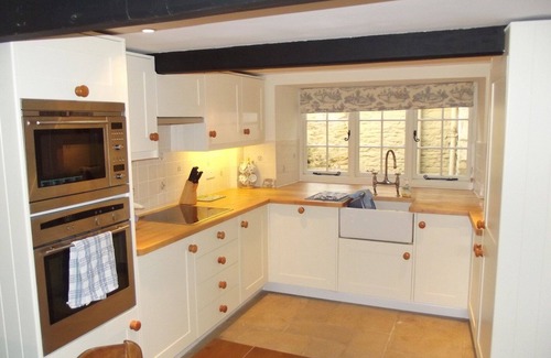 Castle Combe Cottage | A picturesque 15th century three storey stone cottage fully equipped & furnished