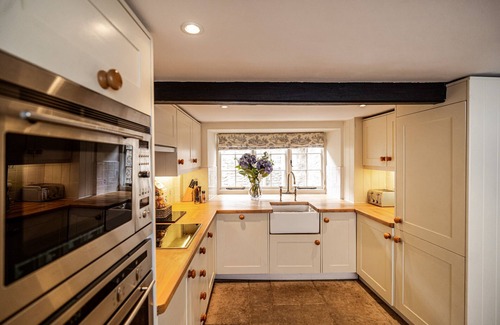 Castle Combe Cottage | A picturesque 15th century three storey stone cottage fully equipped & furnished