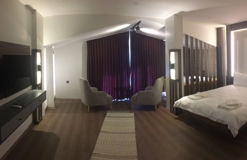 Ayder Apartment | A place having historical arc-bridge view, a garden by river to spend time!