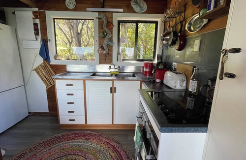 Tuateawa Cabin | A private, funky cabin surrounded by natures beauty with the best views in town.