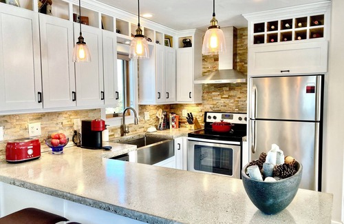 Boyne Falls House | A River Runs Through It! Charming 2-bedroom home near Walloon Lake