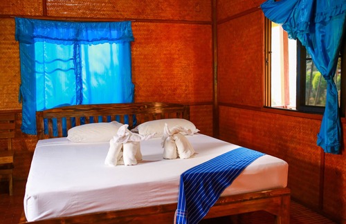 Mae Wang Cabin | a room with rice fields view