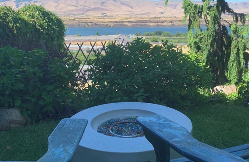 The Dalles Apartment | A shady retreat within a flower garden, with a boutique hotel feel. Close in