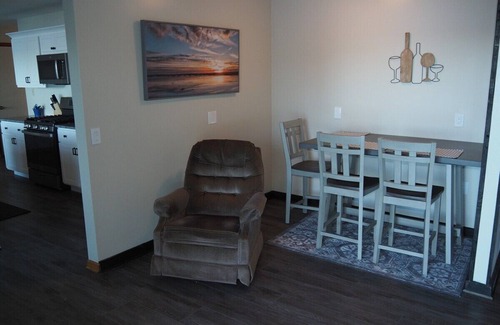 Elk Rapids Cottage | A Short's Walk - Sandy Lakefront with Spa/Hot Tub and Kayaks!