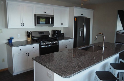 Elk Rapids Cottage | A Short's Walk - Sandy Lakefront with Spa/Hot Tub and Kayaks!
