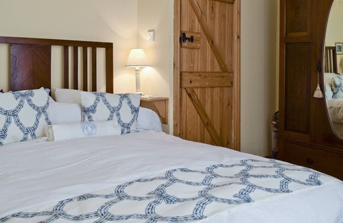 Muker Cottage | A south facing cottage situated in an elevated position within the traditional Yorkshire Dales villa