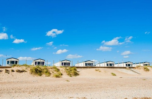 Caister-on-Sea House | A spacious caravan with one master double and one twin room.