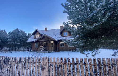 Lubiatowo House | A spacious wooden house to dream away in between the forest, dunes and white sandy beach