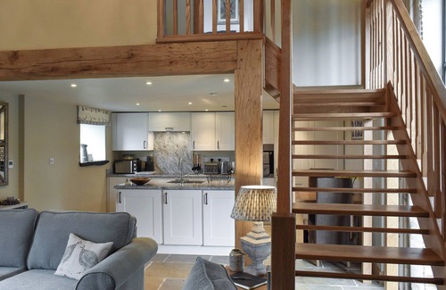 Corwen Cottage | A stunning barn conversion with hot tub, great views and a very comfy kingsize bed.