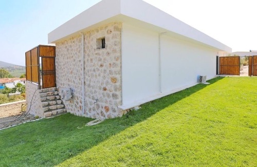 Patara Villa | A stunning contemporary villa with views towards the sea at Patara.